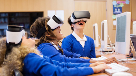 Group of students using virtual reality goggles iStock-664198918.jpg